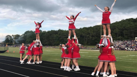 Former Cheer Coach, Smith, Passes the Spirit Stick to Oliver