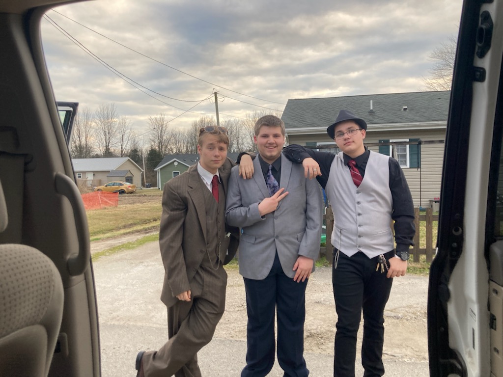MCHS students, Davis Powell, Dylan Banks, and Isiah Denning before the 2022 MCHS semi-formal dance.