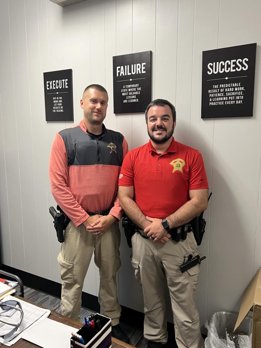 Madison Consolidated Schools Safety Director, Jacob McVey (left)  and Madison Consolidated High School resource officer, Cody Teltow (right)
