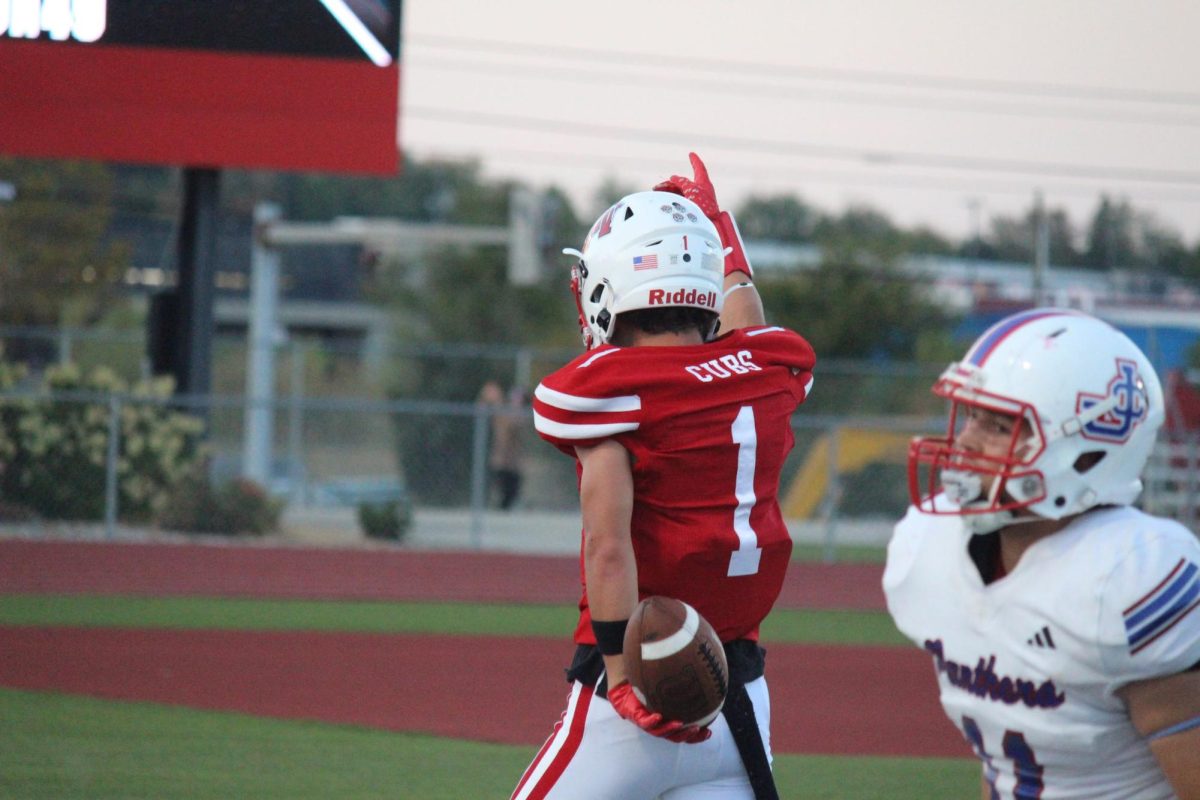 Madison Cub football standout Jake Dyer celebrates after making a big play.